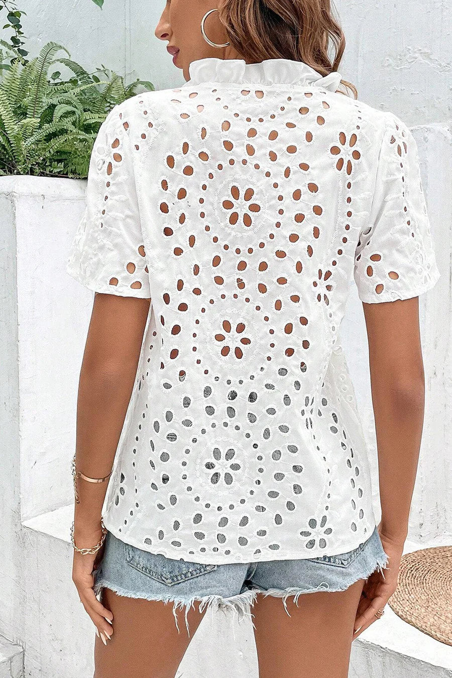 Blouse with v-neck, relaxed fit and elegant details for women