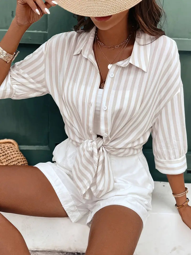 Single-breasted striped blouse with a modern, classic touch for women