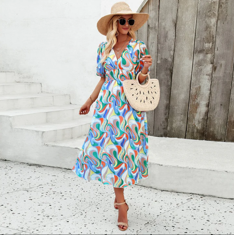 Alette | midi dress with puff sleeves and floral print