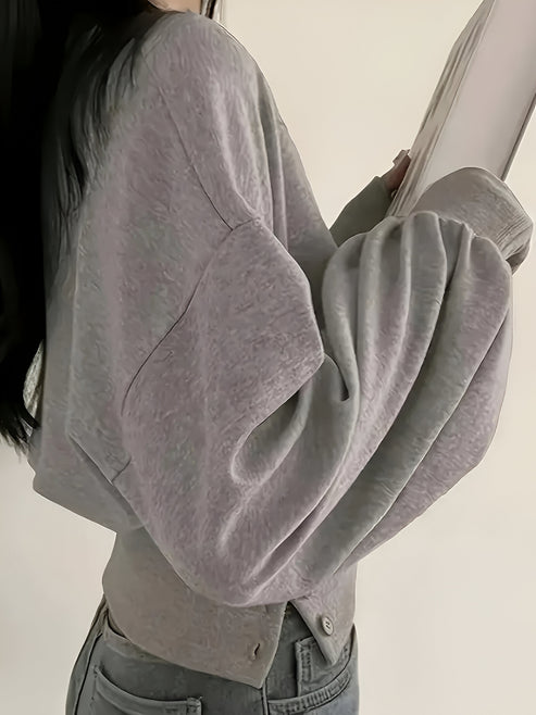 Letia | casual luxury: elegant plain colored t-shirt with button detail