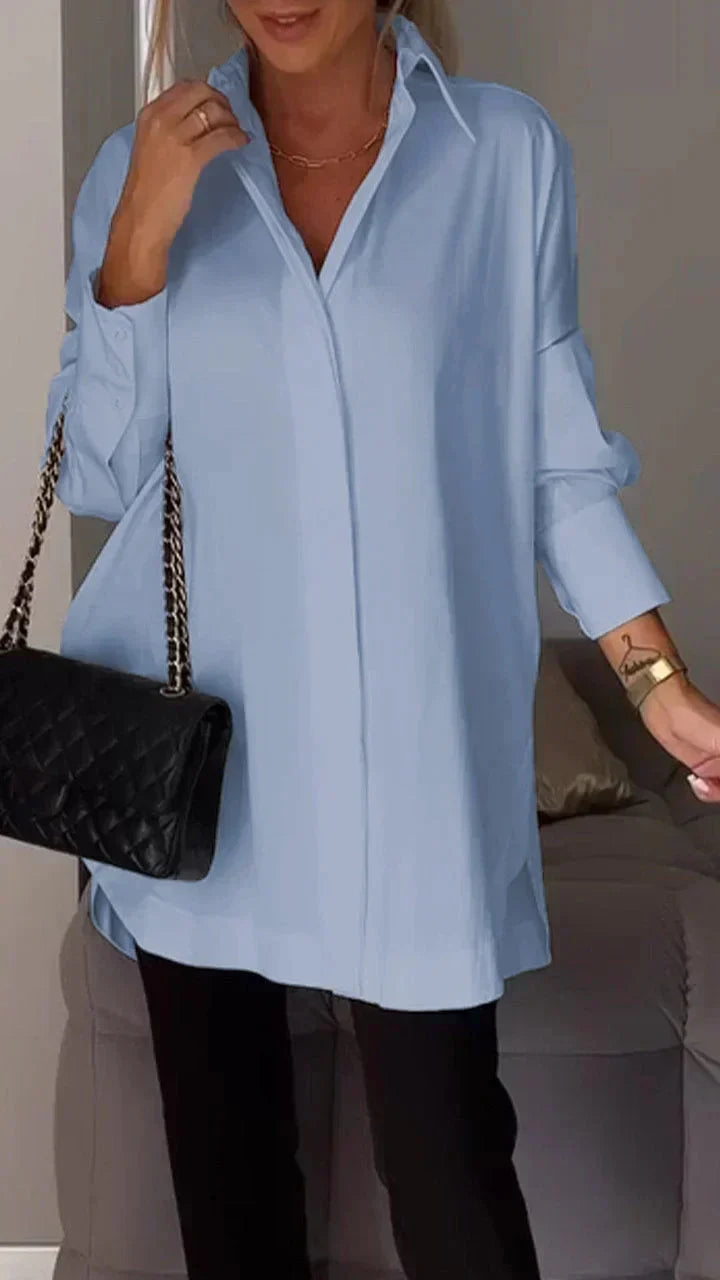 Elegant oversized blouse with rolled up sleeves
