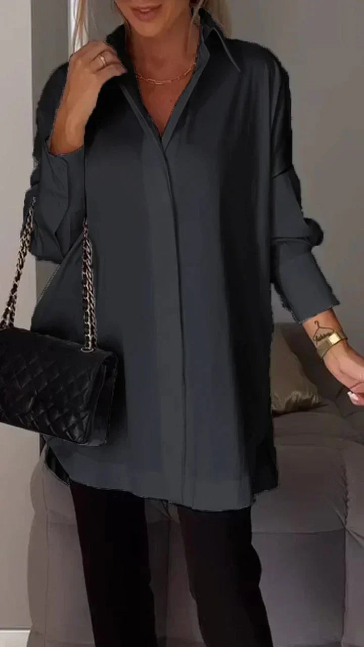 Elegant oversized blouse with rolled up sleeves