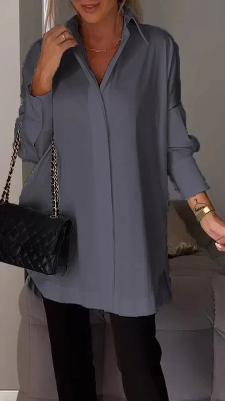 Elegant oversized blouse with rolled up sleeves