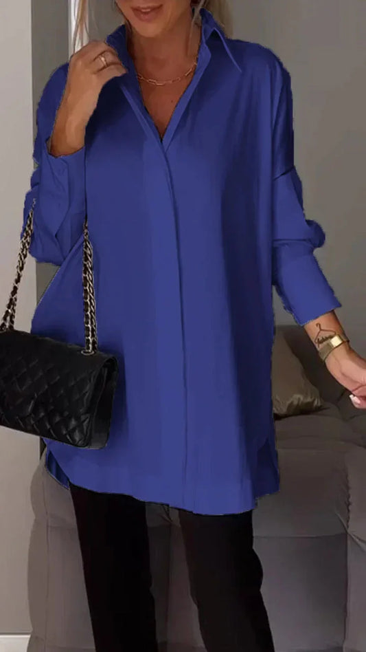 Elegant oversized blouse with rolled up sleeves