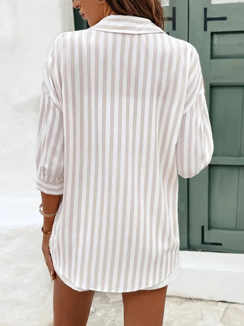 Single-breasted striped blouse with a modern, classic touch for women