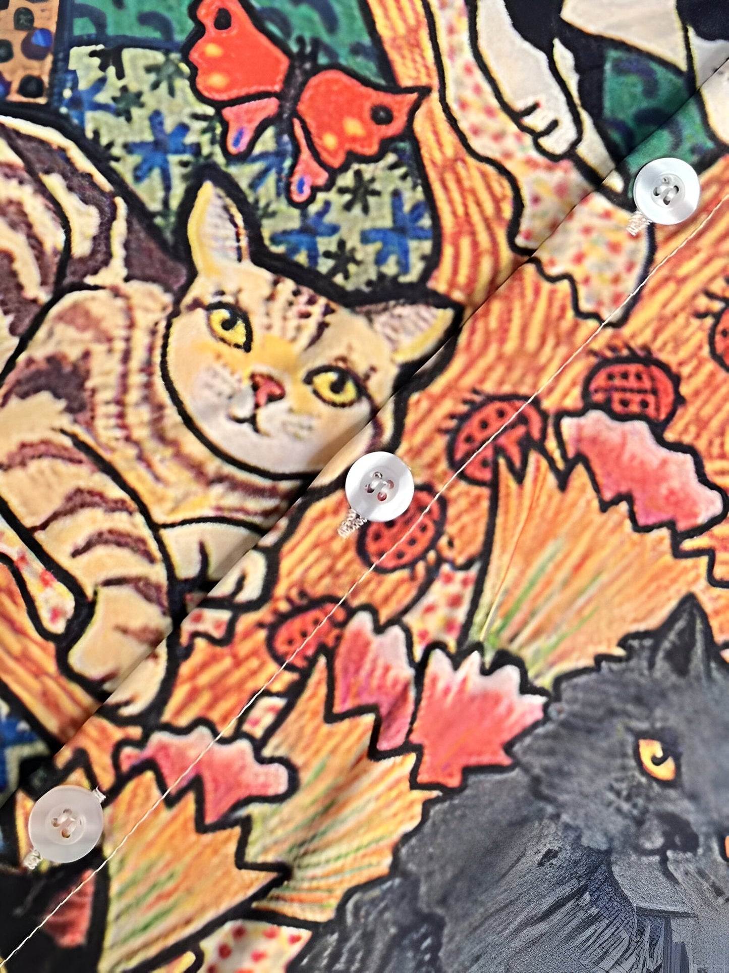 Naomi | playful and colorful top with cat and butterfly