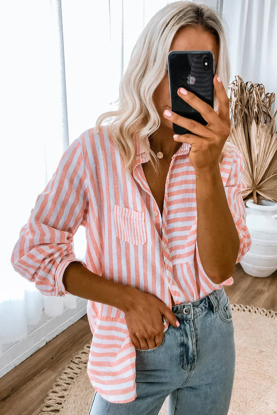 Casual long-sleeved shirt with pink stripes and classic design for women