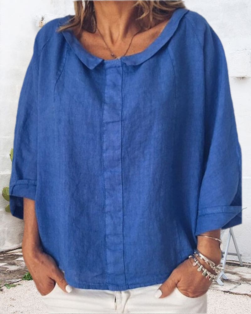 Nora | a loose-fitting shirt in a solid color