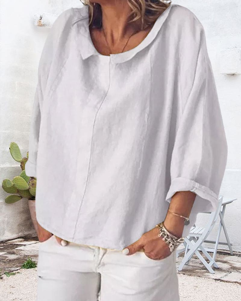 Nora | a loose-fitting shirt in a solid color