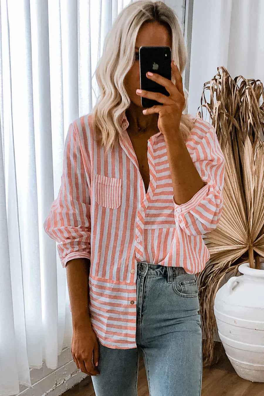 Casual long-sleeved shirt with pink stripes and classic design for women