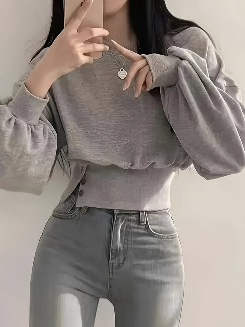 Letia | casual luxury: elegant plain colored t-shirt with button detail