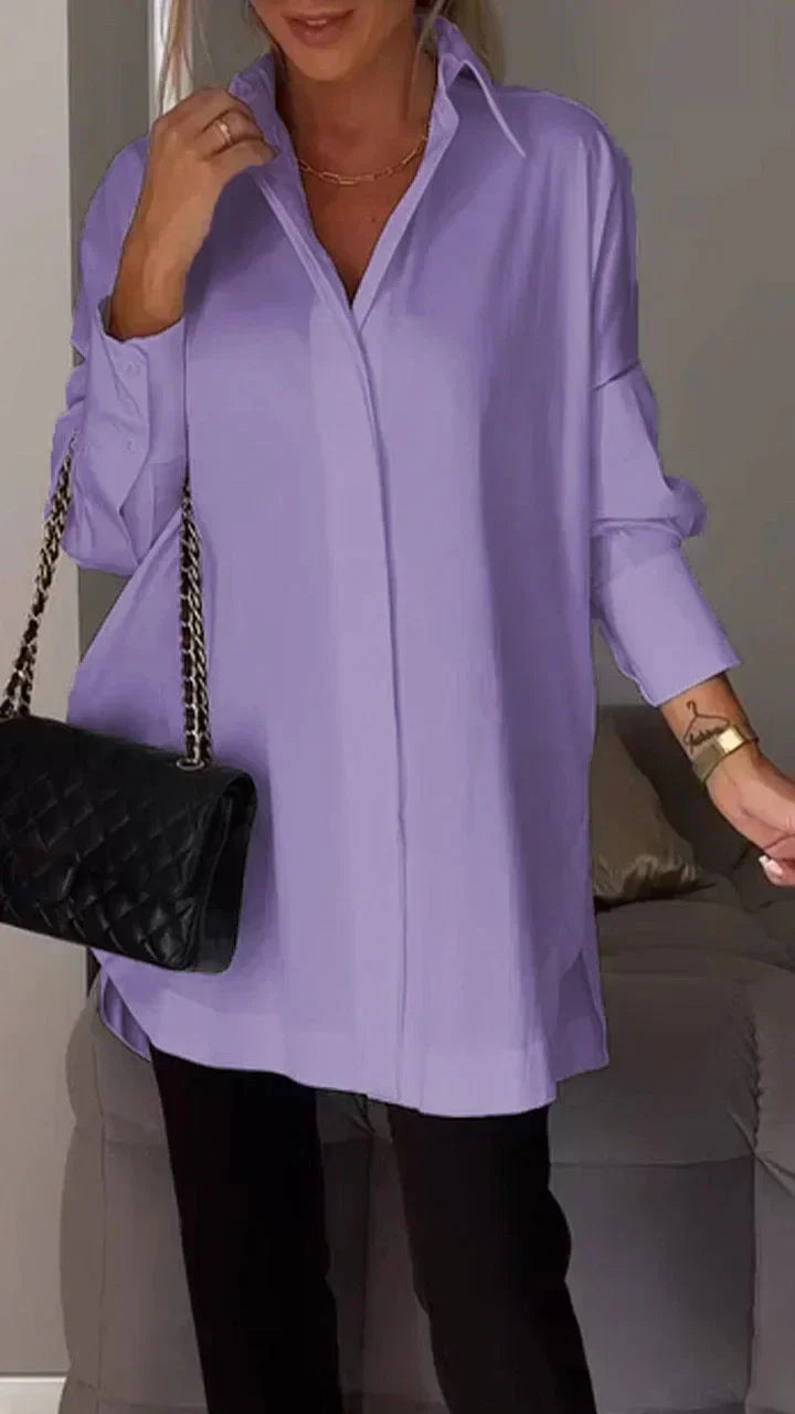 Elegant oversized blouse with rolled up sleeves