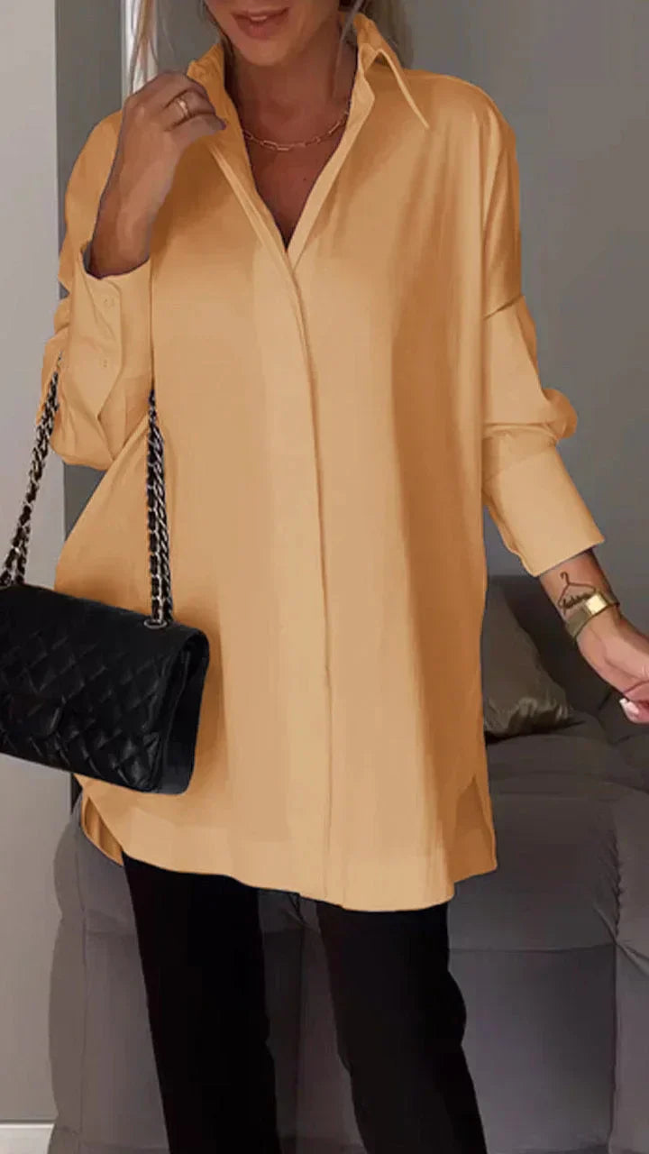 Elegant oversized blouse with rolled up sleeves
