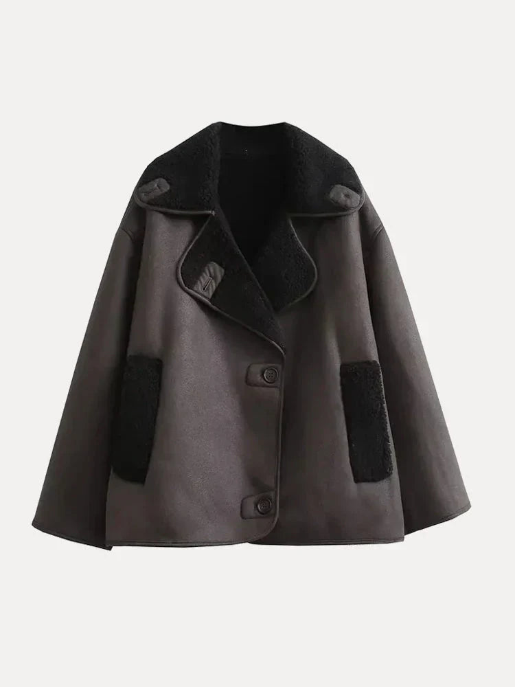 Oversized women's coat in leather with fur