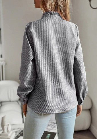 Eisley – elegant blouse with ruffles