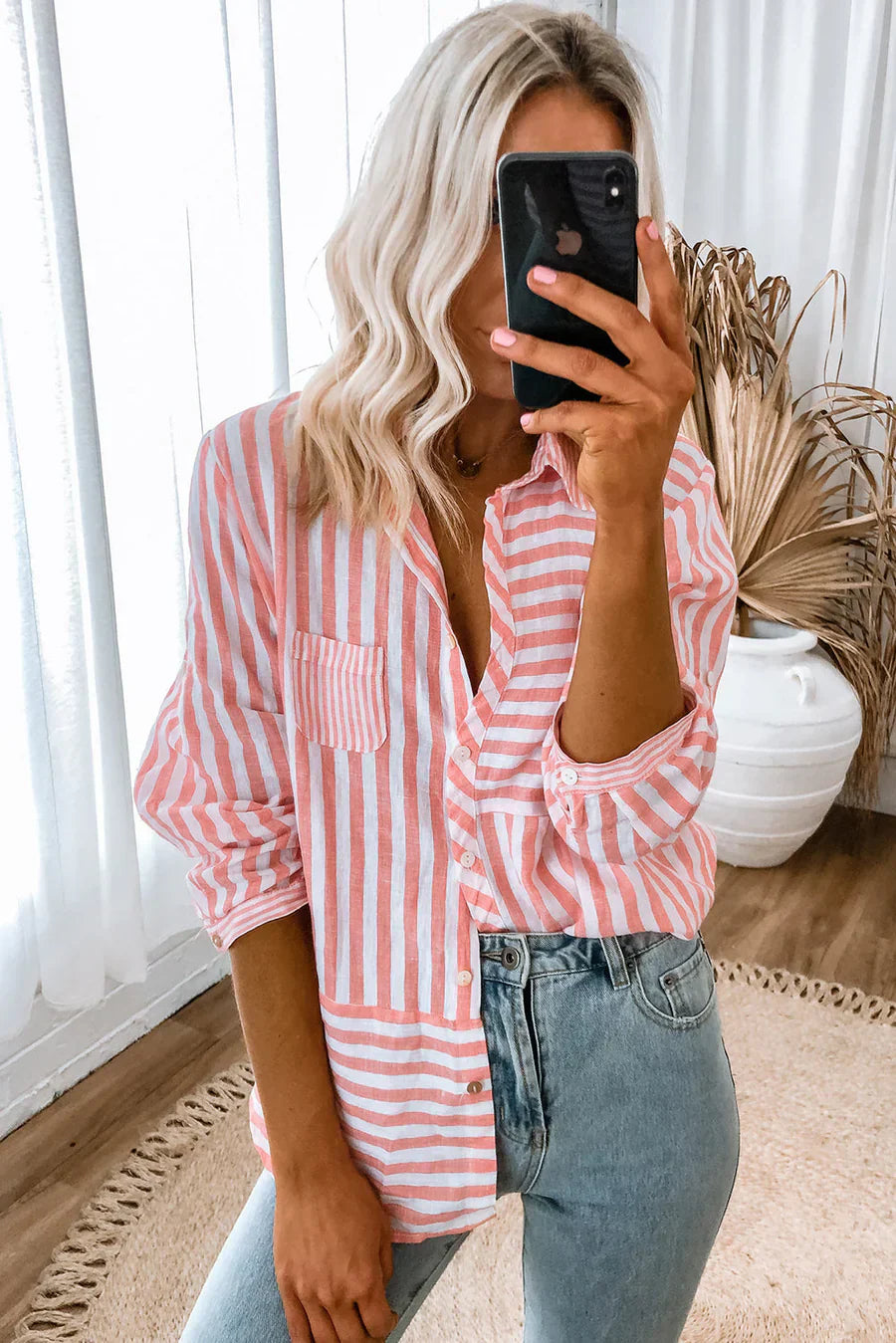 Casual long-sleeved shirt with pink stripes and classic design for women
