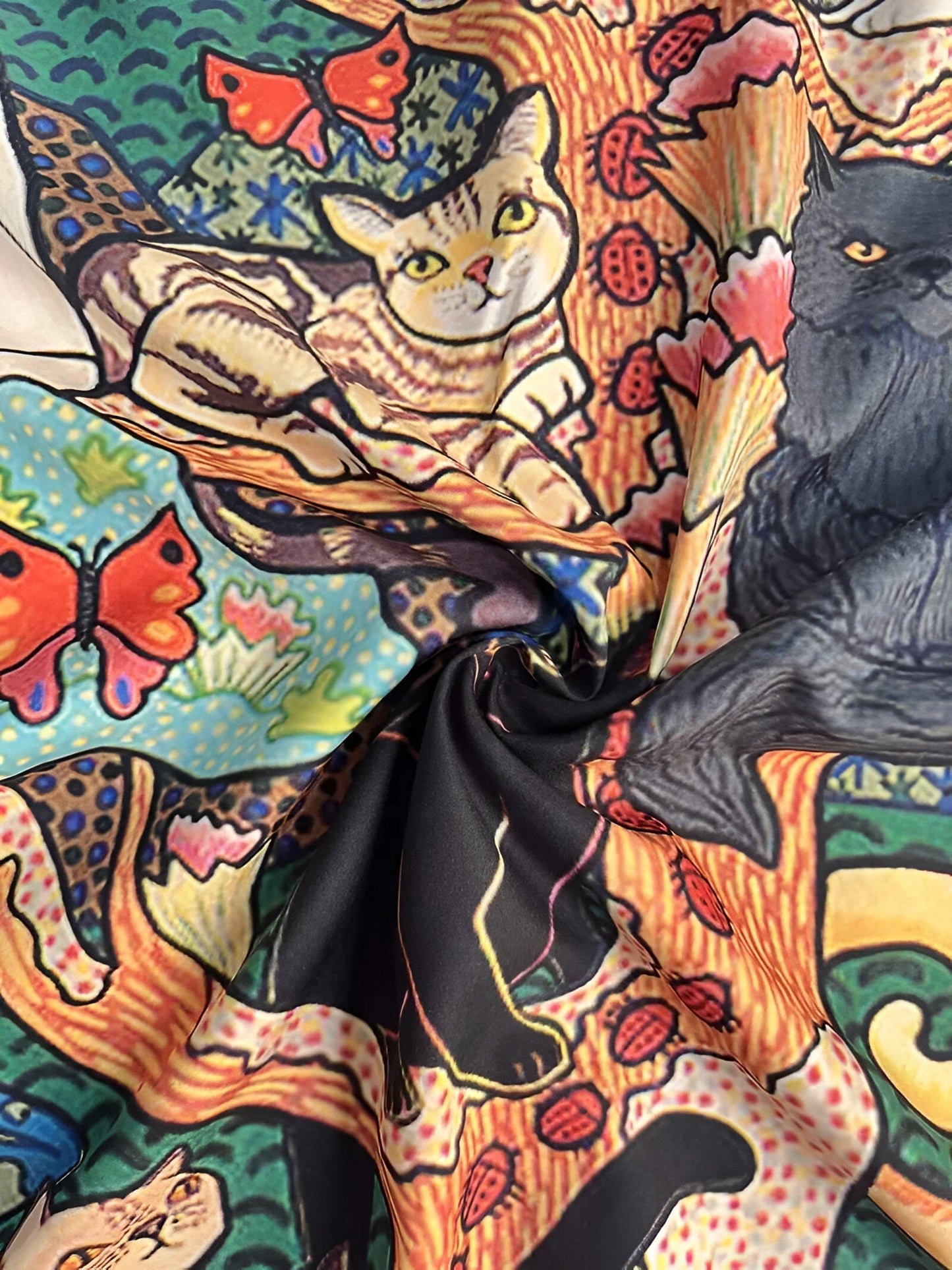 Naomi | playful and colorful top with cat and butterfly